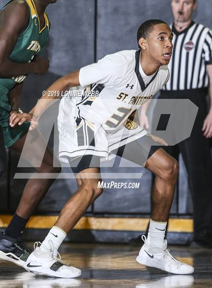 Thumbnail 1 in Trinity Catholic vs St. Anthony's (New York Holiday Invitational) photogallery.