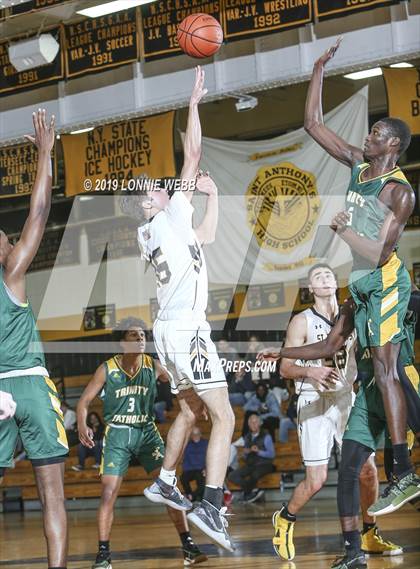 Thumbnail 1 in Trinity Catholic vs St. Anthony's (New York Holiday Invitational) photogallery.