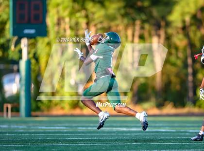 Thumbnail 3 in The Woodlands (green) vs Grand Oaks (blue) photogallery.