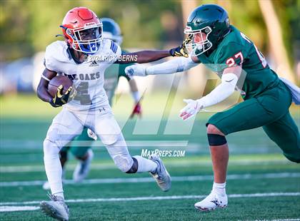 Thumbnail 1 in The Woodlands (green) vs Grand Oaks (blue) photogallery.