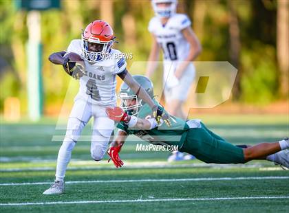 Thumbnail 1 in The Woodlands (green) vs Grand Oaks (blue) photogallery.