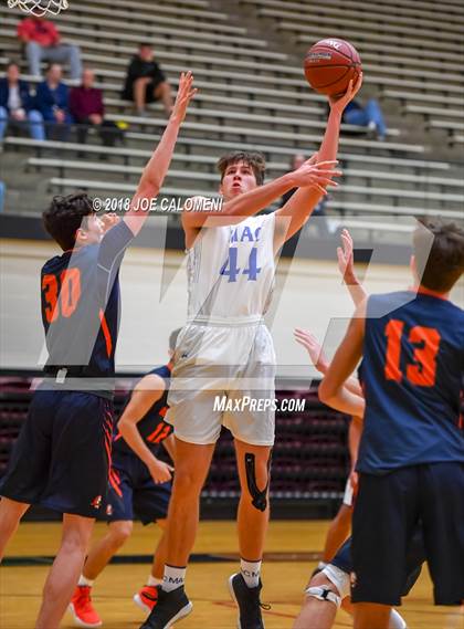 Thumbnail 2 in MacArthur [Douglas] vs Brandeis (NEISD/NISD Basketball Tournament) photogallery.