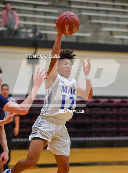 Thumbnail 2 in MacArthur [Douglas] vs Brandeis (NEISD/NISD Basketball Tournament) photogallery.