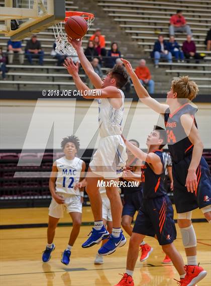 Thumbnail 1 in MacArthur [Douglas] vs Brandeis (NEISD/NISD Basketball Tournament) photogallery.