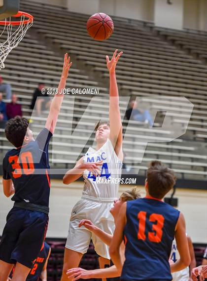 Thumbnail 1 in MacArthur [Douglas] vs Brandeis (NEISD/NISD Basketball Tournament) photogallery.