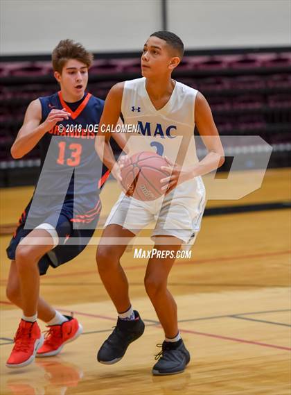 Thumbnail 3 in MacArthur [Douglas] vs Brandeis (NEISD/NISD Basketball Tournament) photogallery.