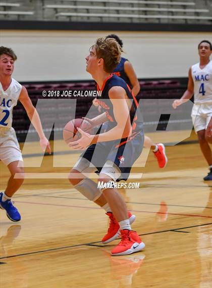Thumbnail 3 in MacArthur [Douglas] vs Brandeis (NEISD/NISD Basketball Tournament) photogallery.