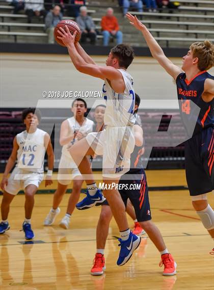 Thumbnail 2 in MacArthur [Douglas] vs Brandeis (NEISD/NISD Basketball Tournament) photogallery.