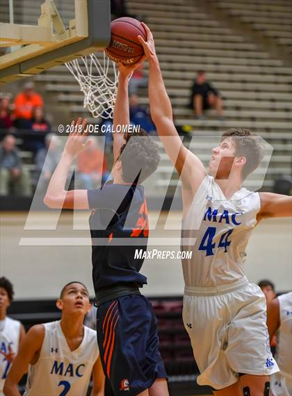 Thumbnail 3 in MacArthur [Douglas] vs Brandeis (NEISD/NISD Basketball Tournament) photogallery.