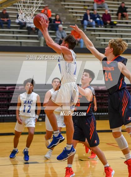 Thumbnail 3 in MacArthur [Douglas] vs Brandeis (NEISD/NISD Basketball Tournament) photogallery.