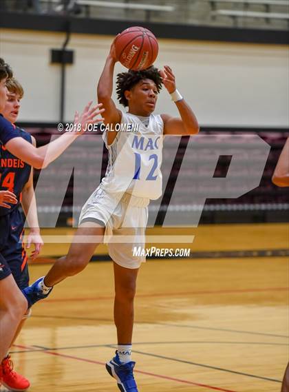 Thumbnail 1 in MacArthur [Douglas] vs Brandeis (NEISD/NISD Basketball Tournament) photogallery.