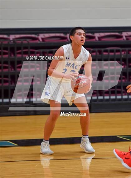Thumbnail 2 in MacArthur [Douglas] vs Brandeis (NEISD/NISD Basketball Tournament) photogallery.