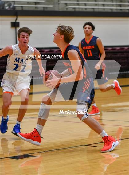 Thumbnail 1 in MacArthur [Douglas] vs Brandeis (NEISD/NISD Basketball Tournament) photogallery.