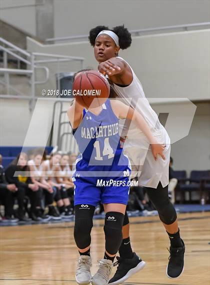 Thumbnail 2 in MacArthur [Douglas] vs Brennan (NISD Basketball Tournament) photogallery.