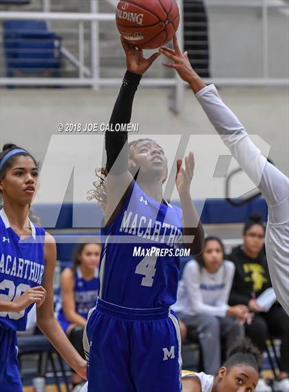 Thumbnail 3 in MacArthur [Douglas] vs Brennan (NISD Basketball Tournament) photogallery.