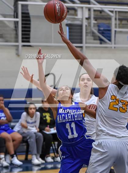 Thumbnail 2 in MacArthur [Douglas] vs Brennan (NISD Basketball Tournament) photogallery.