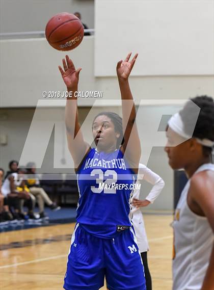 Thumbnail 2 in MacArthur [Douglas] vs Brennan (NISD Basketball Tournament) photogallery.