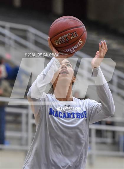 Thumbnail 2 in MacArthur [Douglas] vs Brennan (NISD Basketball Tournament) photogallery.
