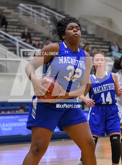 Thumbnail 3 in MacArthur [Douglas] vs Brennan (NISD Basketball Tournament) photogallery.