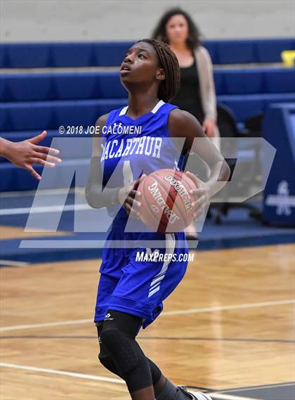Thumbnail 2 in MacArthur [Douglas] vs Brennan (NISD Basketball Tournament) photogallery.