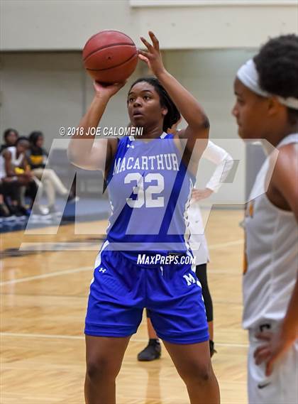 Thumbnail 1 in MacArthur [Douglas] vs Brennan (NISD Basketball Tournament) photogallery.