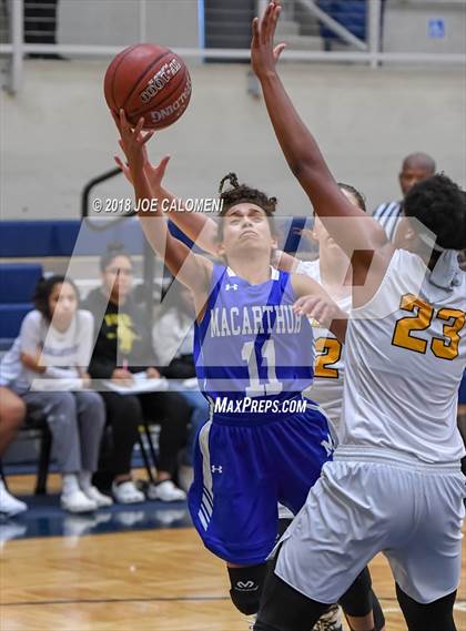 Thumbnail 1 in MacArthur [Douglas] vs Brennan (NISD Basketball Tournament) photogallery.