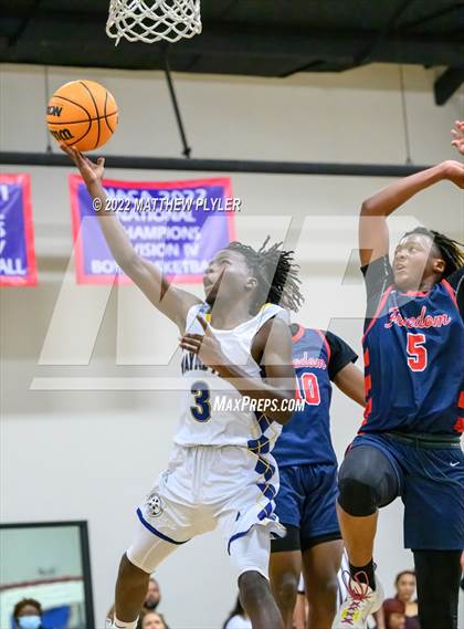 Thumbnail 1 in Freedom Christian Academy vs. Wayne Preparatory Academy (Ike Levy Veterans Basketball Tournament) photogallery.