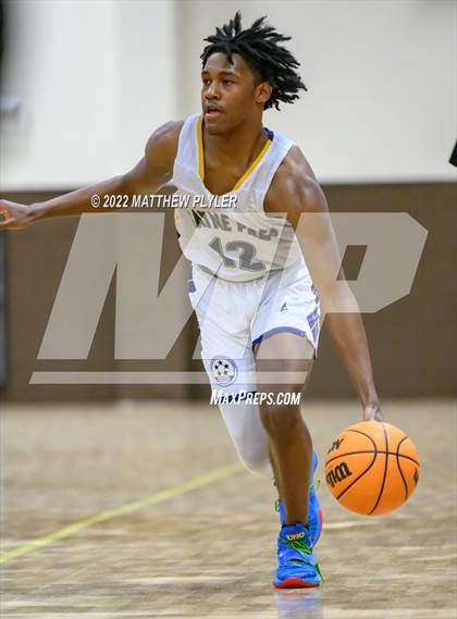 Thumbnail 2 in Freedom Christian Academy vs. Wayne Preparatory Academy (Ike Levy Veterans Basketball Tournament) photogallery.