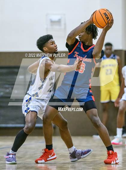 Thumbnail 2 in Freedom Christian Academy vs. Wayne Preparatory Academy (Ike Levy Veterans Basketball Tournament) photogallery.