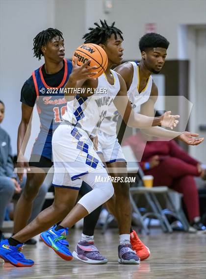 Thumbnail 2 in Freedom Christian Academy vs. Wayne Preparatory Academy (Ike Levy Veterans Basketball Tournament) photogallery.