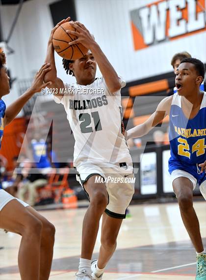 Thumbnail 2 in DeLand vs Mainland (JV Shoot-out at Spruce Creek) photogallery.