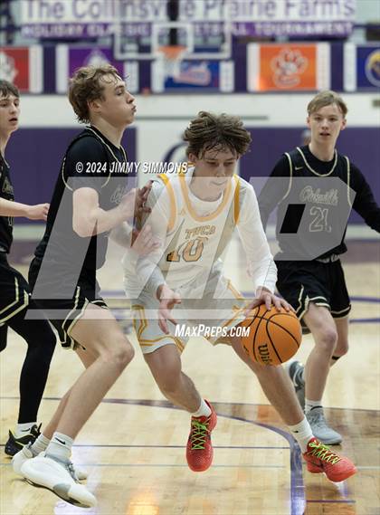 Thumbnail 1 in The Woodlands Christian Academy vs Oakville Tigers (Prairie Farms Holiday Classic) photogallery.