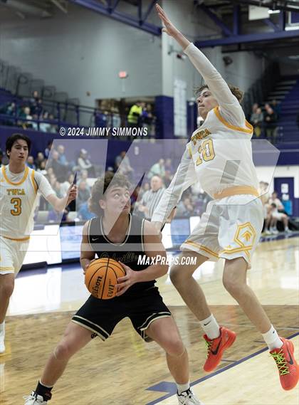 Thumbnail 1 in The Woodlands Christian Academy vs Oakville Tigers (Prairie Farms Holiday Classic) photogallery.