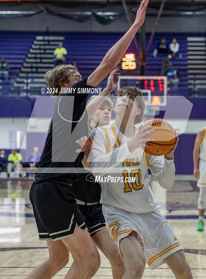 Thumbnail 2 in The Woodlands Christian Academy vs Oakville Tigers (Prairie Farms Holiday Classic) photogallery.