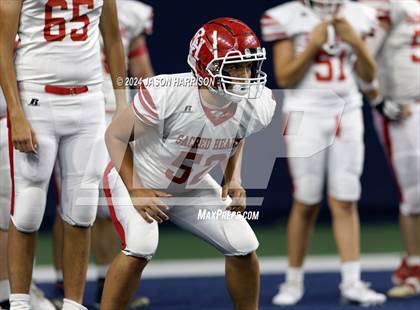 Thumbnail 2 in John Paul II vs. Sacred Heart photogallery.