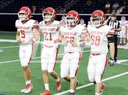 Thumbnail 2 in John Paul II vs. Sacred Heart photogallery.