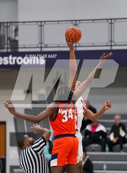 Thumbnail 2 in Lawrence North vs Gary West Side (Sneakers for Santa Shootout) photogallery.