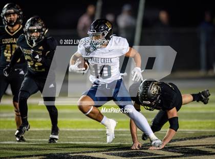 Thumbnail 2 in Lake Creek vs. Crockett (UIL Football 5A Division 2 Region III Area) photogallery.