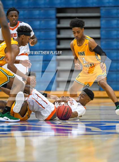 Thumbnail 3 in Southern Lee vs. Pine Forest (Cumberland County Schools Basketball Holiday Classic) photogallery.