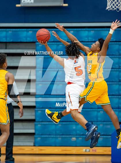 Thumbnail 1 in Southern Lee vs. Pine Forest (Cumberland County Schools Basketball Holiday Classic) photogallery.