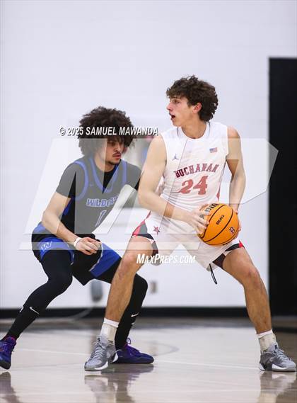 Thumbnail 1 in Buchanan vs Windward (Warrior Holiday Showcase) photogallery.