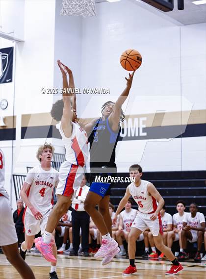 Thumbnail 2 in Buchanan vs Windward (Warrior Holiday Showcase) photogallery.