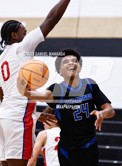 Thumbnail 1 in Buchanan vs Windward (Warrior Holiday Showcase) photogallery.