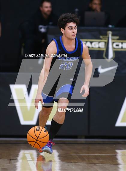 Thumbnail 1 in Buchanan vs Windward (Warrior Holiday Showcase) photogallery.