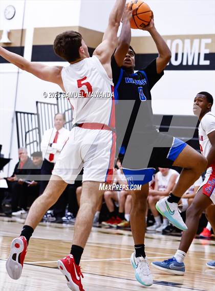 Thumbnail 3 in Buchanan vs Windward (Warrior Holiday Showcase) photogallery.