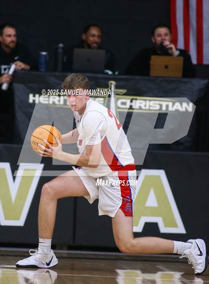 Thumbnail 2 in Buchanan vs Windward (Warrior Holiday Showcase) photogallery.