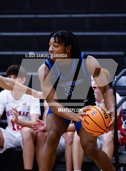 Thumbnail 1 in Buchanan vs Windward (Warrior Holiday Showcase) photogallery.