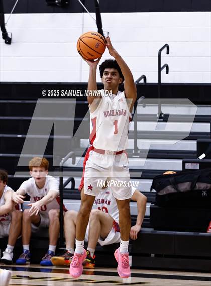 Thumbnail 1 in Buchanan vs Windward (Warrior Holiday Showcase) photogallery.