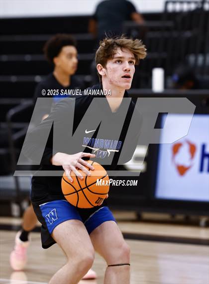 Thumbnail 1 in Buchanan vs Windward (Warrior Holiday Showcase) photogallery.