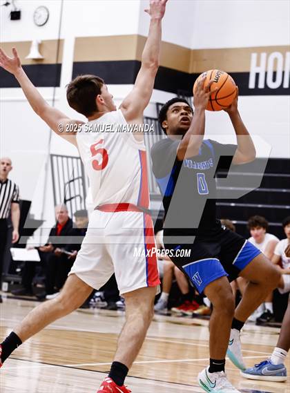 Thumbnail 2 in Buchanan vs Windward (Warrior Holiday Showcase) photogallery.